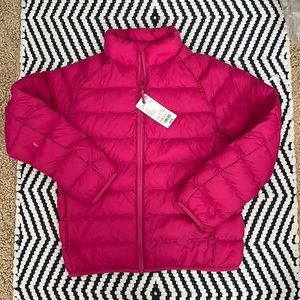 Kids Uniqlo, pink puffer jacket in size 11-12.